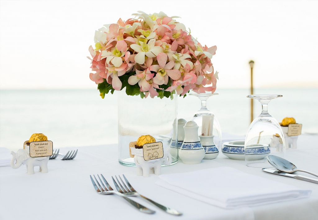A romantic table setting on a beach in Koh Yao Noi, Thailand.